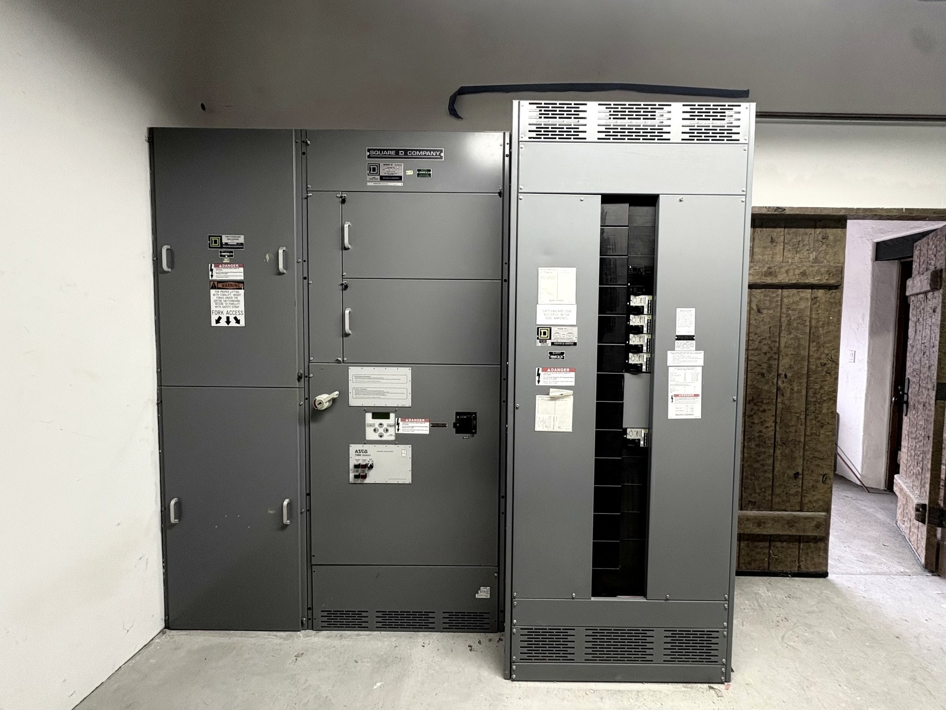 Square D commercial switchgear in a panel room